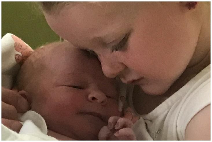 Hayden welcoming Carter to our World